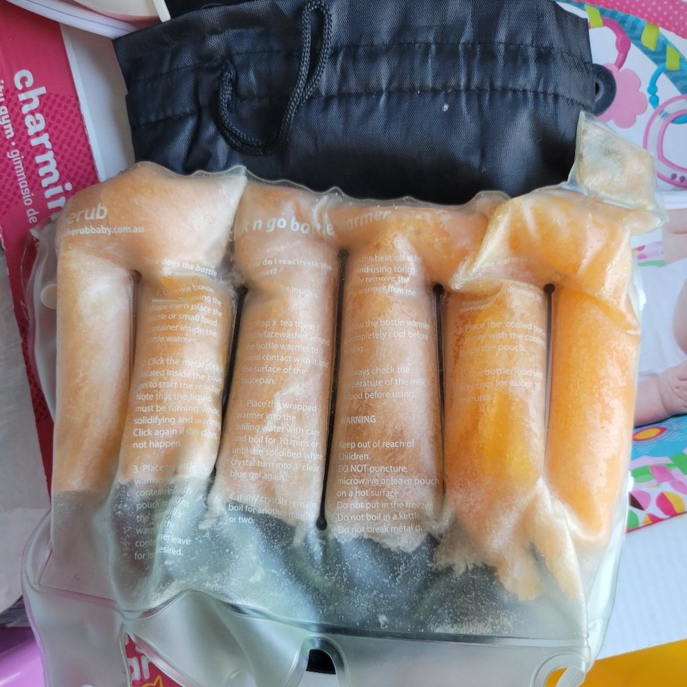 Click N Go Portable baby bottle warmer